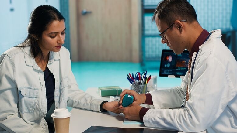 Dr. Nikhil Kajale consulting a patient at Vakratunda Hospital