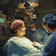 Endoscopic brain and spine surgery procedure performed in a modern hospital operating room