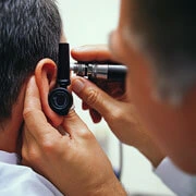 Comprehensive ENT examination by specialist doctor evaluating ear, nose and throat conditions at Vakratunda Hospital