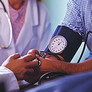Nephrologist consulting patient for hypertension, metabolic disorders, and lifestyle management to protect kidney health